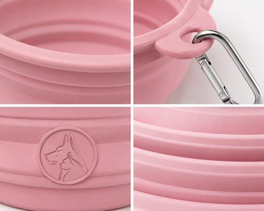 Pink collapsible dog bowl with metal carabiner and dog head logo detail