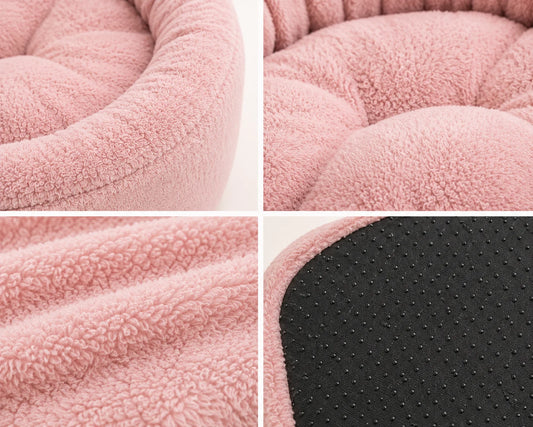 Close-up images of a pink pet bed with a soft, plush exterior and non-slip bottom