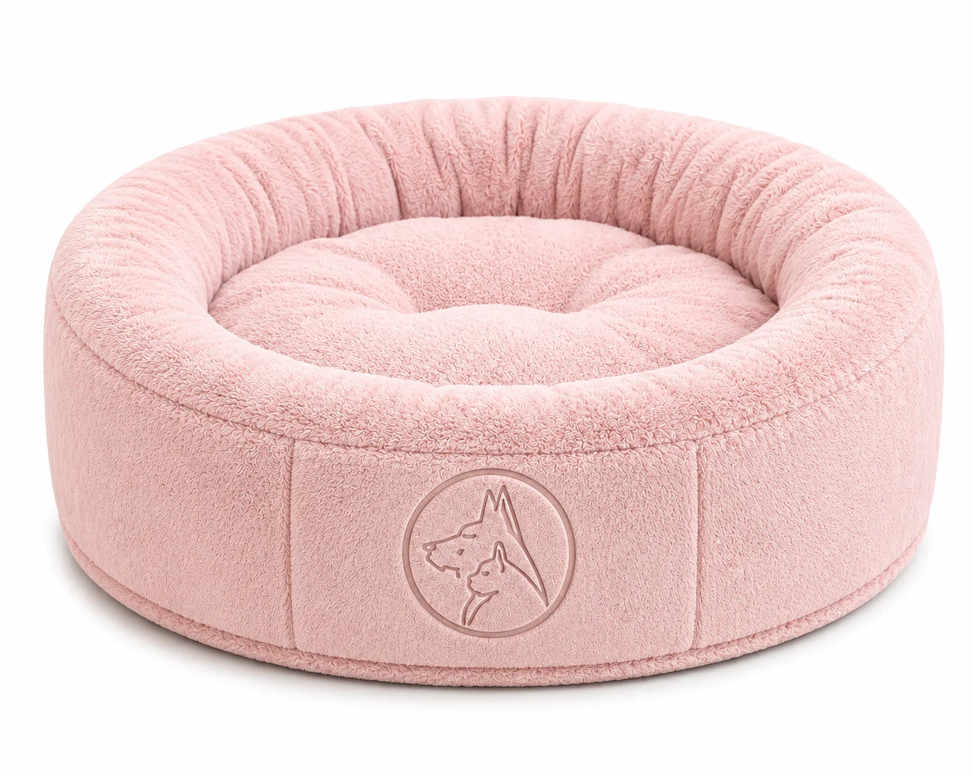 Soft pink pet bed with embossed dog logo on side, plush interior and exterior